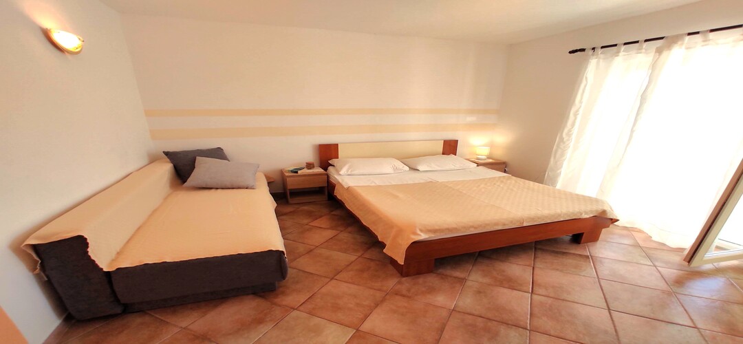 Three balconies of the apartment in Slatine with a view of the sea and the surroundings